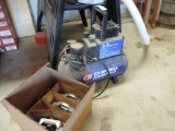 Campbell Hausfeld quiet air small compressor and cleat kit.