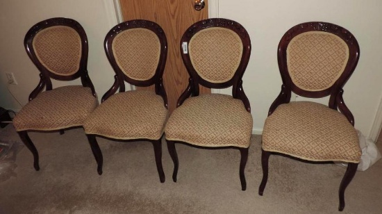 4 beautiful ornate carved cherry wood chairs in excellent condition.
