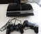 PlayStation 3 with 2 controllers.