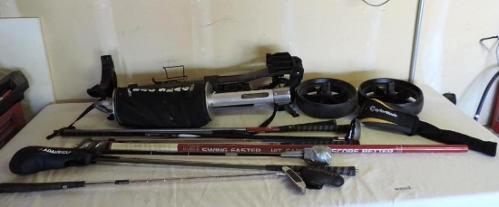 Golf clubs and gear assortment.