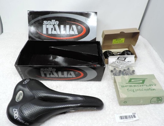 Sella Pro-Link TA Gel Flow bike seat and frog pedals.