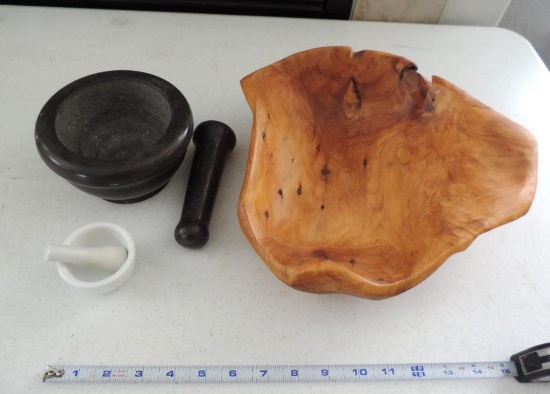Burl wood bowl and stone grinders.