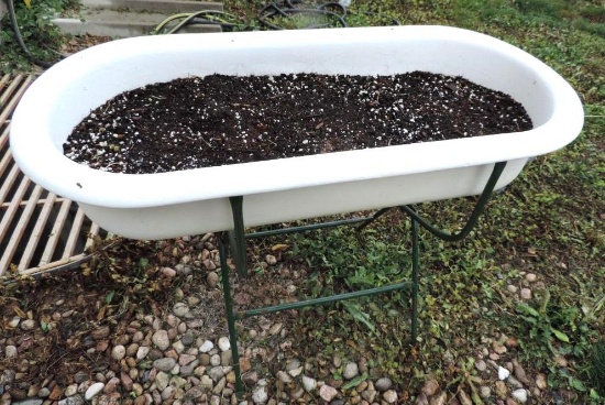 Adorable 39x18x8" wash tub planter with stand.