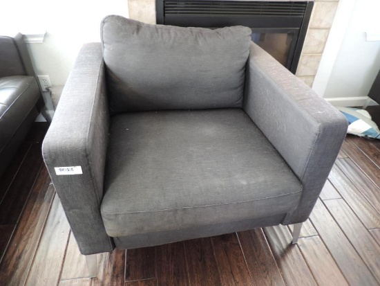 Grey upholstered chair.