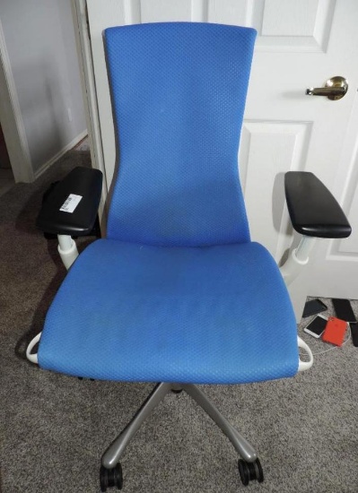 Blue Herman Miller office chair.