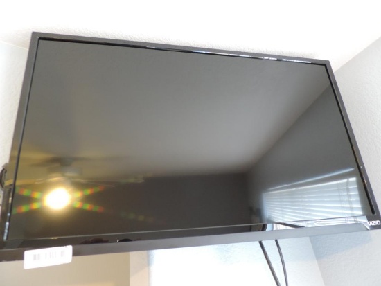 Vizio 32" LCD TV with wall mount.