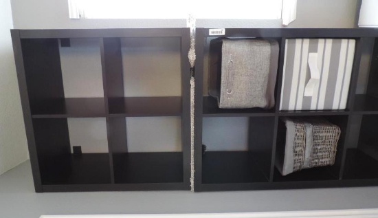 Two black organizer shelf units.