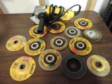 DeWalt DW402 angle grinder with lots of cutting wheels.