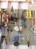 Pegboard full of tools.