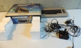 Vintage Commodore 64 computer with box.