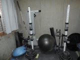 Tuff stuff weight bench with weights and accessories.