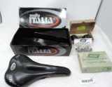 Sella Pro-Link TA Gel Flow bike seat and frog pedals.