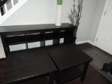 Black sofa/entry table with 2 side tables and 2 Ikea vases.