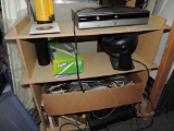Shelf loaded with electronics.