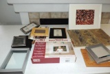 Assortment of art and picture frames.