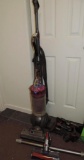 Dyson DC 41 animal vacuum with attachments.