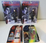 Star Wars and Edward Scissorhands figurines.