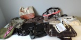 Assortment of purses and handbags.