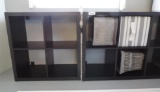 Two black organizer shelf units.