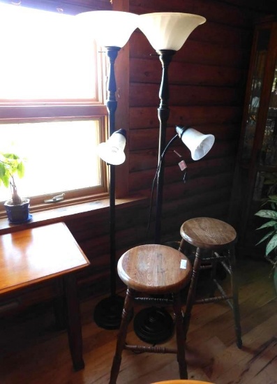 Two matching floor lamps and two matching oak stools.