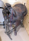 Antique saddle on stand