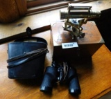 Bausch and Lomb binoculars and brass transit