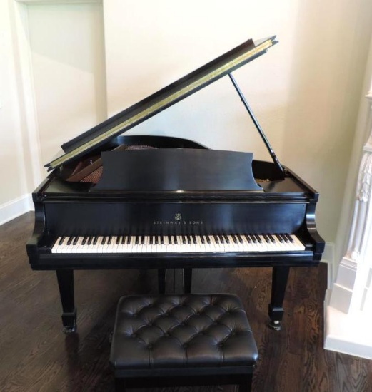 Beautiful black Steinway and Sons grand piano.