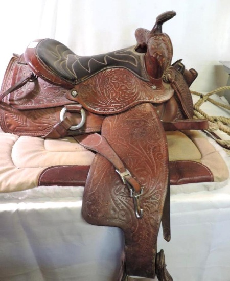 15" western saddle with chest piece and saddle blanket.
