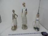 Three Lladro figurines.