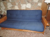 Oak frame footan couch.