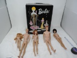 Vintage barbies with 1962 case.