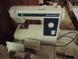 Kenmore sewing machine with notions.