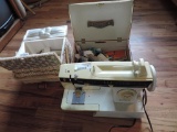 Singer Merrit 2430 sewing machine with notions.