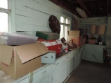Contents of north wall of garage.