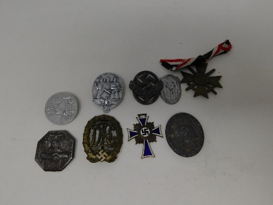 Collection of WWII German badges and pins