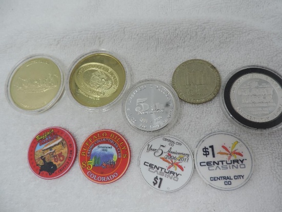 Collector chips assortment including 1oz 999 silver chip.