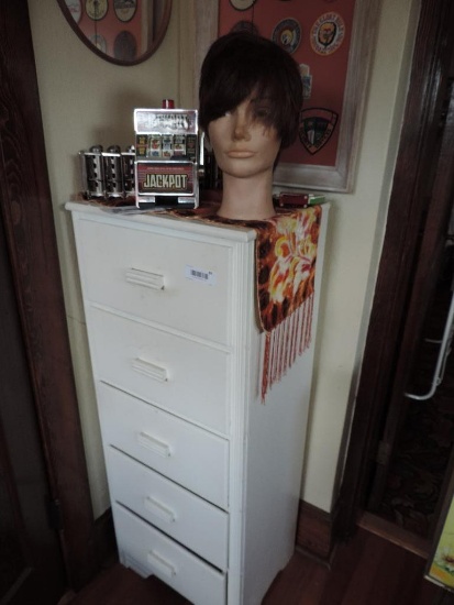 White wooden 5 drawer cabinet with contents.