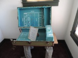 Antique traveling suitcase craps table.