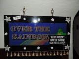 Over the rainbow sign.