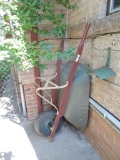 Metal wheelbarrow in good condition.