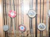 Casino bolo ties and $ clip assortment.