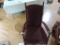 Maroon rocking chair and inlayed plant stand.