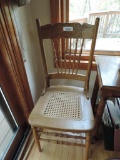 7 carved back kane seat chairs.