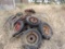 Assortment of early car wheels.