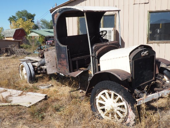 Early (unknown year) GMC flat bed truck