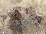 Pile of antique wheels.