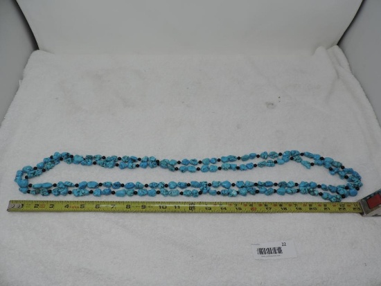 Massive 8' turquois necklace.