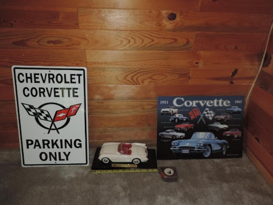 Metal corvette signs and model.