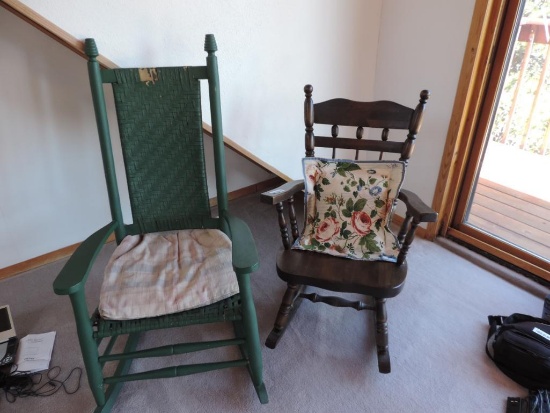 Two rocking chairs.