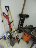 Yard tools and shop vac.